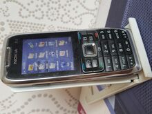 Nokia E51, зарядное устройство, USB-кабель, карта памяти 2 ГБ