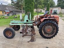Traktor T-16 koos muldajaga