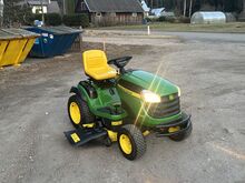 Садовый трактор John Deere X166