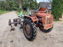Traktor T-16 koos muldajaga
