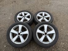 Оригинальные 17-дюймовые литые диски VW с летней резиной