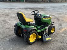 Садовый трактор John Deere X166