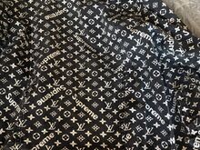 Louis Vuitton X Supreme teksatagi