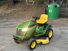 Садовый трактор John Deere X166