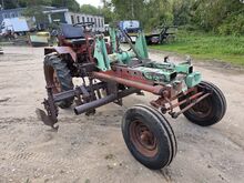 Traktor T-16 koos muldajaga