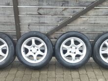 14-дюймовые литые диски 4x100 (Mazda)