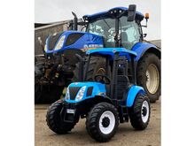 Детский электрический трактор New Holland