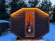 Puuküttega saun Harvia kerisega