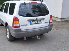 Мазда Трибьют
