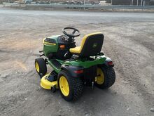 Садовый трактор John Deere X166