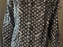 Louis Vuitton X Supreme teksatagi