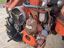 Traktor T-16 koos muldajaga