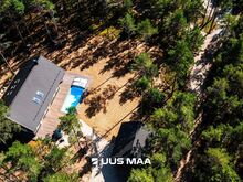 Põhjamaise arhitektuuriga eramu Dirhami männimetsas