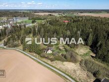 Hoonestatud kinnistu metsatuka serval