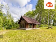 Palkmaja järve kaldal!