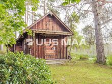 Hubane maja metsas – privaatne pelgupaik looduse keskel.
