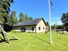 Energiatõhus ühekordne kivimaja tünnisaunaga
