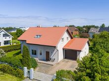 Valgusküllane perekodu mereäärses Tiskres
