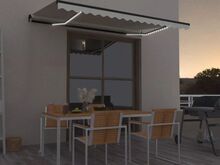 vidaXL käsitsi sissetõmmatav varikatus, LED, 450x300 cm kreemjas
