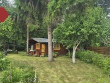 Müüa hubane ja hoolitsetud kinnistu koos 16 m² suuruse suvemajaga ja mõnusa verandaga — ideaal