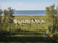 Mereäärne kinnistu. Puurkaev ja elekter olemas.