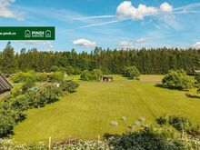 Müüa hooldatud kinnistu, millel asuvad viljapuud, marjapõõsad ja kuur