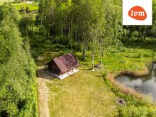 Palkmaja järve kaldal!