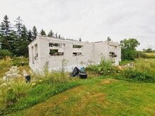 Vana talukoht uue ehitatava majaga