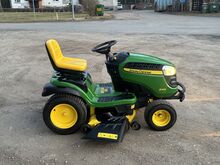 Садовый трактор John Deere X166