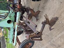 Traktor T-16 koos muldajaga