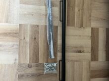 Universal seatbelt harness bar