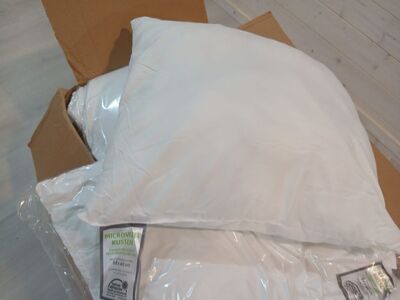 Uued mikrokiudpadjad 50x60, kastis 12tk