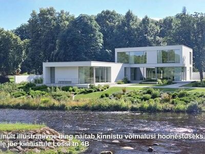Imeline kinnistu jõe kaldal, kesklinnas
