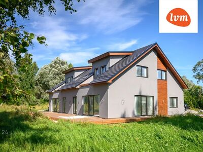 Kaugkütte ja päikesepaneelidega A-energiaklassi paarismaja boks!