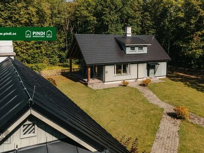 Peahoone koos kõrvalhoonetega suurel mereäärsel metsakinnistul