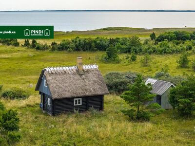 Merepiiriga 4,36 ha kinnistu palkmajaga arenevas Rässa külas