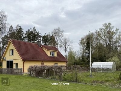 Müüa väga suur krunt kahe elumaja ja avarate kõrvalhoonetega!