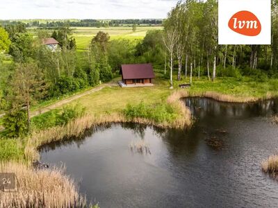 Palkmaja järve kaldal!