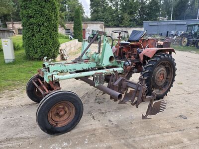 Traktor T-16 koos muldajaga