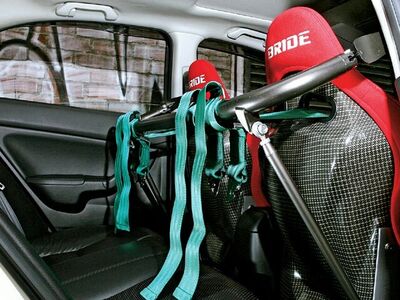 Universal seatbelt harness bar